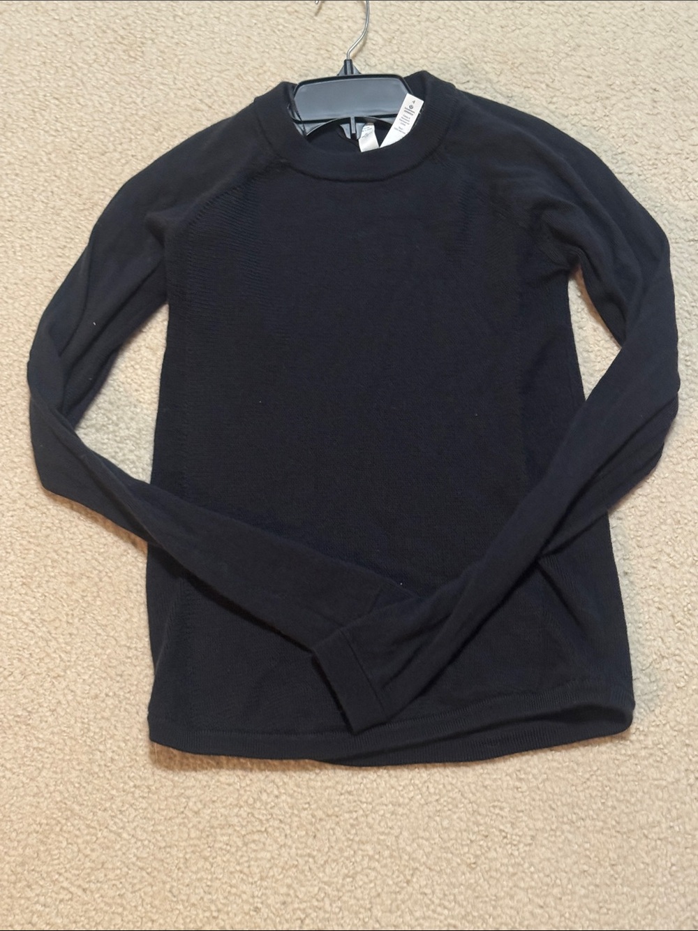 Lululemon women’s black sweater 100% Merino wool size 4